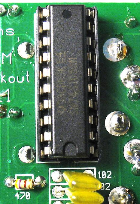 Make sure the notch is pointed downward, matching the socket and the silk-screen on the PCB.