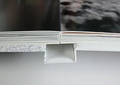 attaches them onto hard covers. This is the most common form of binding for hardcover books.