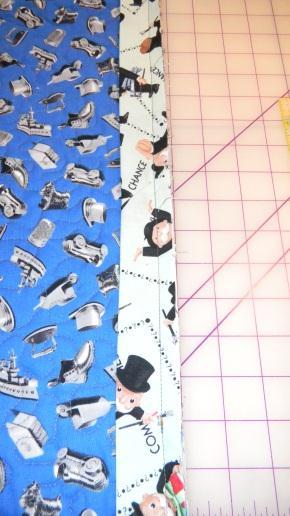 side up, lined up with drawn line on bottom strip Sew from