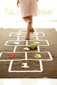 Outdoor games Large group Hopscotch (ELDA 1, 2, 3, 4, 5, 6) Develops gross motor skills, bilateral coordination, balance, social skills, rules of game, memory recall.