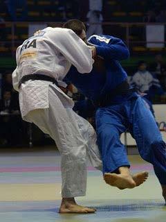 Judo mats are squares with a minimum area of 36 m 2 and a maximum area of