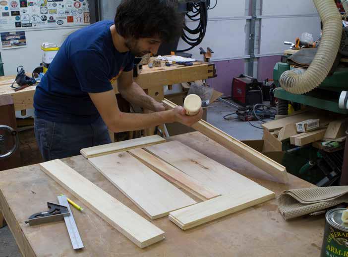 Turn on the saw and carefully raise the dado stack into the sacrificial fence until the dado height matches the thickness of the sidewalls of the grooves that were cut into the door frame