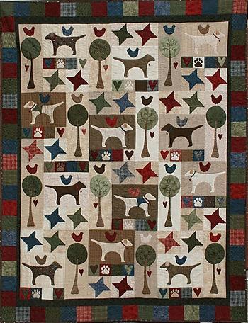 Volume XXXV Number 7 Page 7 September 2015 Quilt for Guide Dogs of America The quilt pattern I chose is called Woof Woof from Lynette Anderson s book It s Quilting Cats and Dogs.