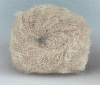 CHAPTER 1 MATERIALS AND TOOLS Alpaca Alpaca fiber comes from the coat of a llamalike animal of the same name that lives in South America. Alpaca yarn is soft, silky, lightweight, and very warm.
