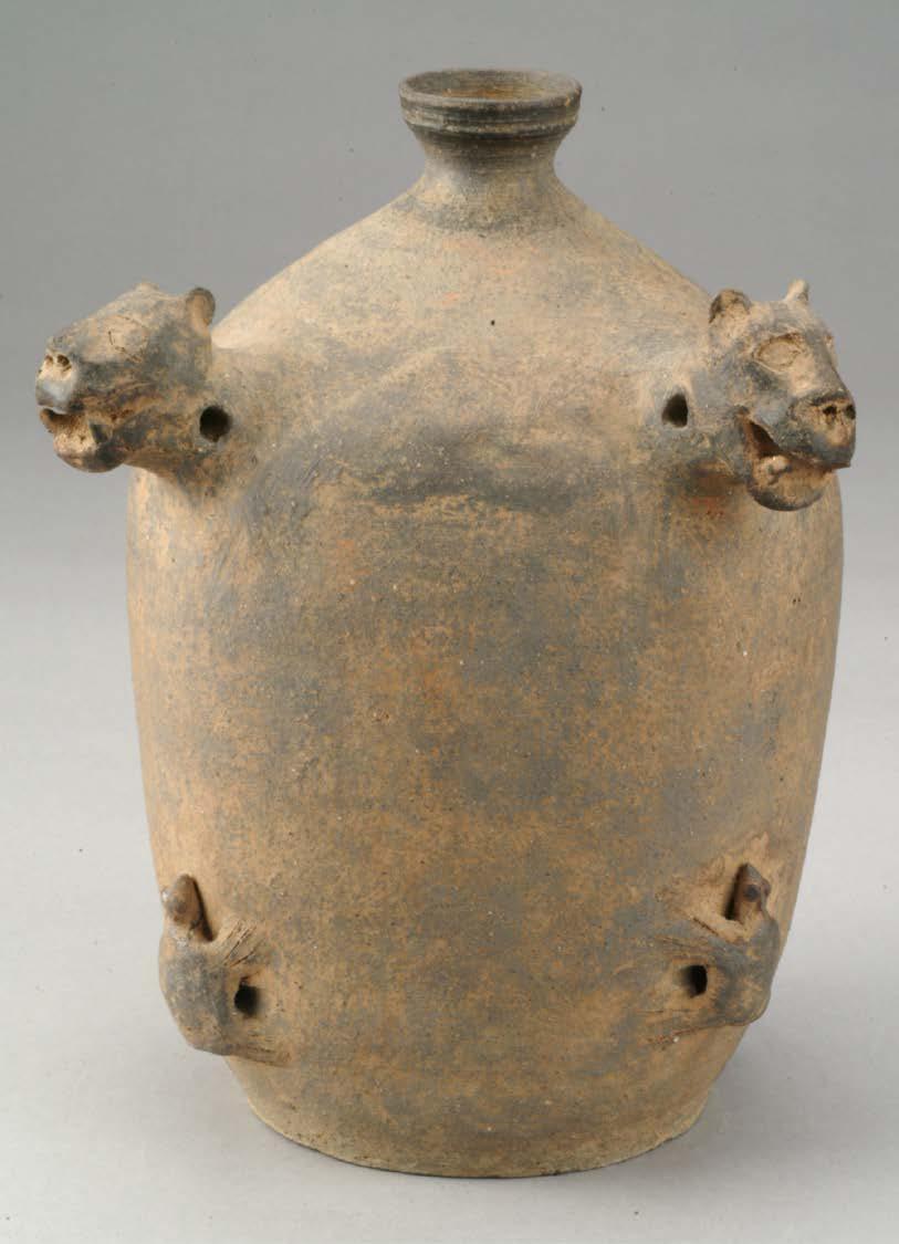 Flattened Bottle with Lion-head and Turtle lugs 10 th 11 th century unglazed stoneware with applied decoration UMMA 2004/1.210 This flattened bottle functioned as a flask for wine or water.