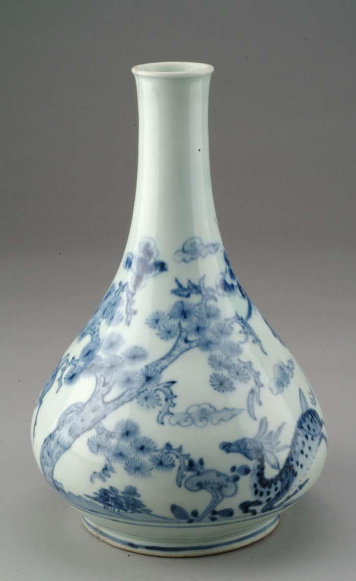 Wine Bottle with 10 Symbols of Longevity 19 th century porcelain with cobalt pigment under colorless glaze UMMA 2004/1.