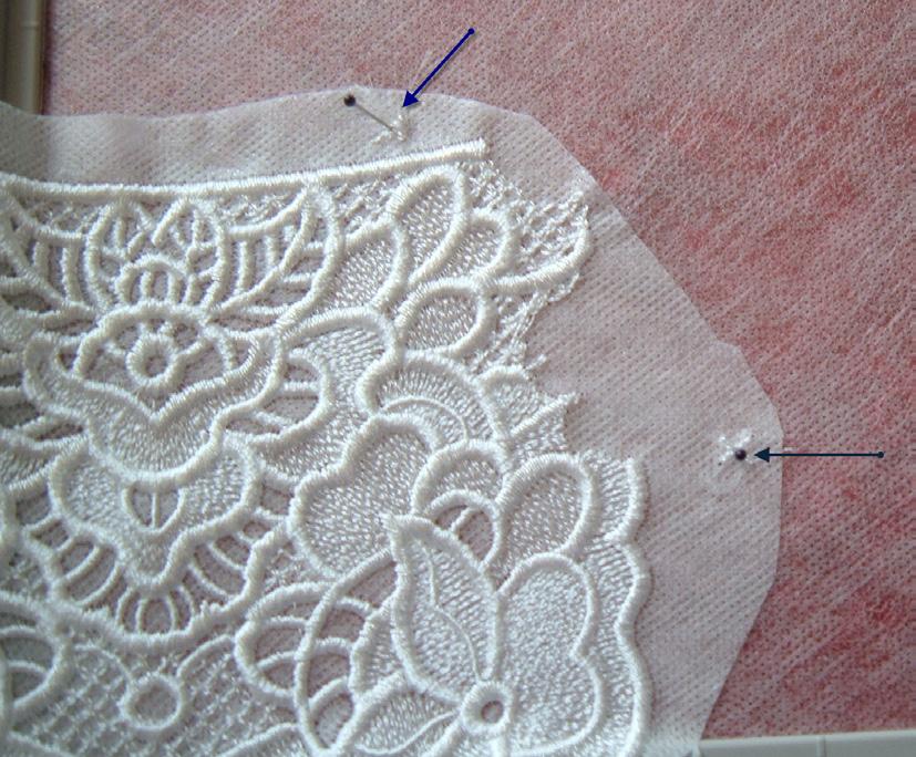 Carefully trim around the outer edge of the lace design.