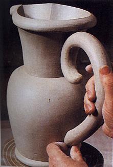 The Pot is Constructed using this moist pliable clay body, using one or several of the construction methods including pinch coil Slab