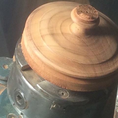 Place the Huon pine spigot into the chuck and turn, and sand, the outside to the internal diameter of the box's top less 1 mm maximum.