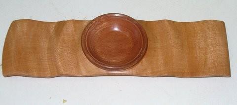Brian showed three large horizontal rimmed platters made from an unknown eucalyptus