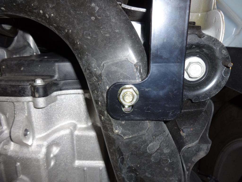4. Attach the driver side support strap to the bolt plate installed in step 3 with the M10 flange nut