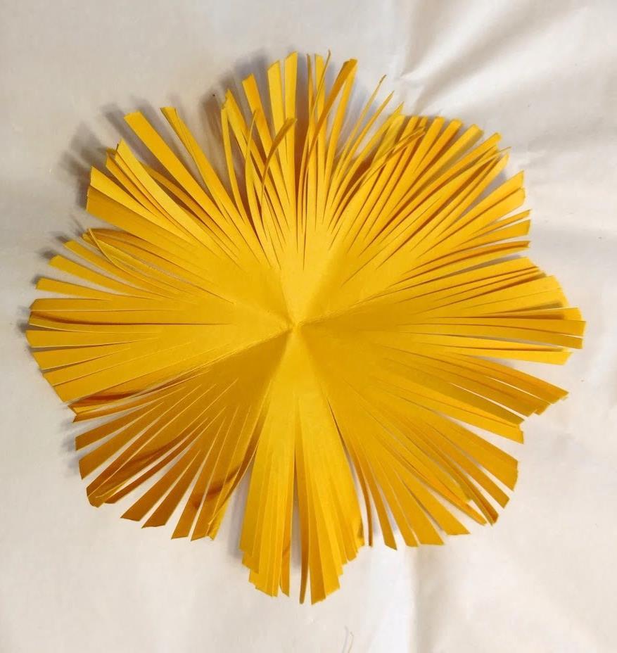 I created this one the same way but I cut each petal into small strips to make it more like a