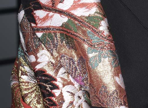 subject s hair and the patterns on her clothing.
