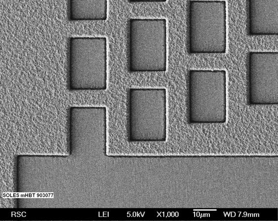 Poly crystal on BPSG epitaxial layers and depth of the windows are optimized such that the III-V devices and CMOS transistors are planar.