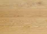 DESIGN WITH PLANKS OAK A floor board with a warm and golden glow