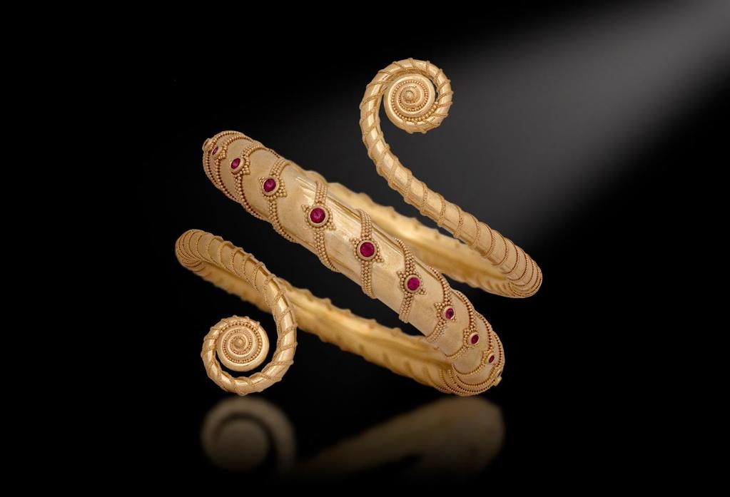 SPIRAL by Kent Raible. 18K gold and ruby.