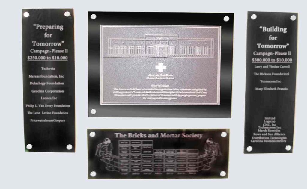 I - Glass and Acrylic This display consists of: Black Glass Header Panel etched with the Building Name & mounted