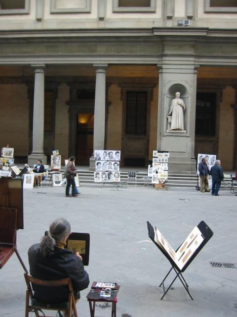 Portrait Street Artists set up shop outside the