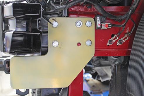 Install 3/8-16 x 1-1/4 bolts with 3/8 lock and flat washers into the holes and 3/8 nut plates in the frame.