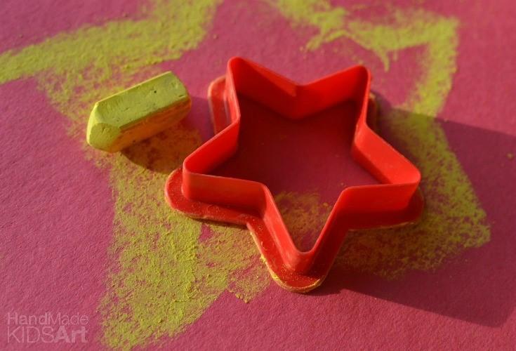 ART Chalk and Cookie Cutter Art Invite children to use chalk and cookie cutters to make individual masterpieces!
