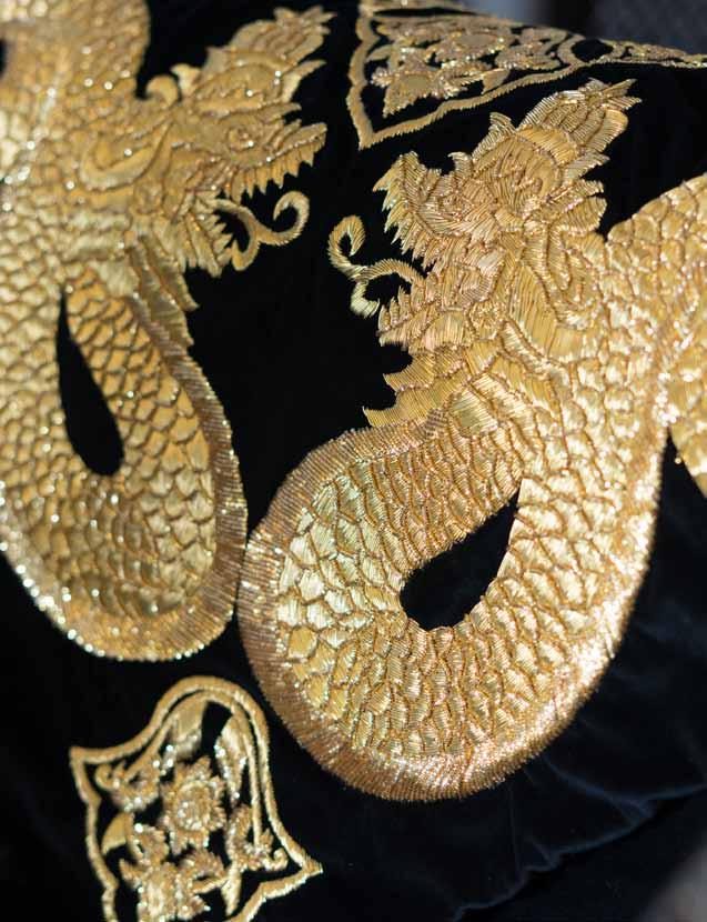 DECORATIVE ORNAMENT Symbolizes the gallantry, both Gurdo and Nogorojo patterns appear in black velvet material with textural detail hand-sewn sequin appliques.