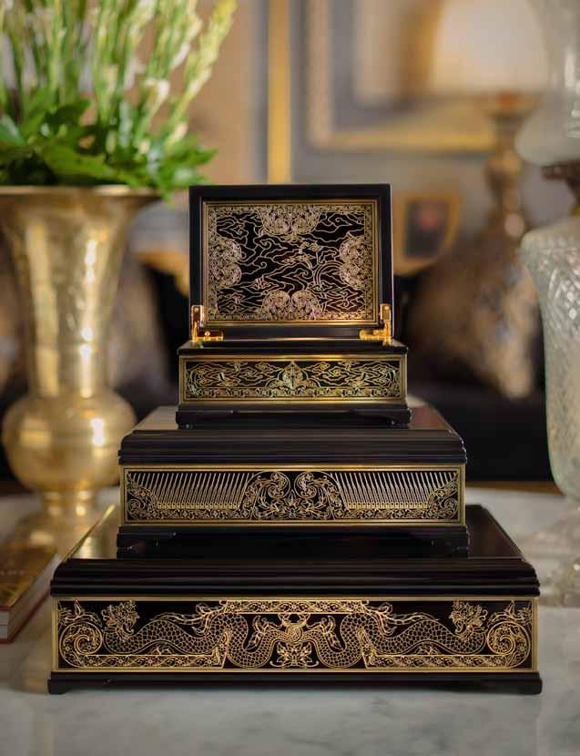 DECORATIVE BOX Beautifully crafted in engineered wood, this decorative box wrapped in solid black lacquer and accentuated in brass element makes this box a lustrous addition to your distinguished