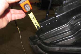 WRX/Outback Installation Only 9. After drilling the top hole, use a flat chisel to knock off the nut on the inside of the frame. Do this on both sides of the vehicle. 10.