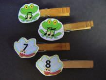 Direction on How to Play Materials you will need: 1. 1 bag of Frogs and Flies 2. 2 regular dice 3. 1 wooden dice 4.