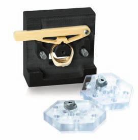 The vise includes a built-in ring clamp, a metal drill guide, and 2 clear tops with 6