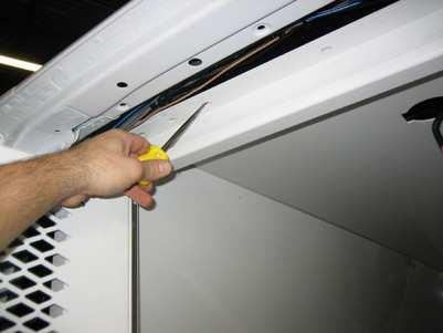 Divider Cut door gasket with utility knife.