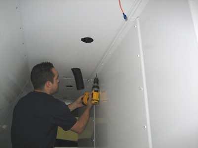 into van floor Pre-drill through Ceiling sections, (using Divider as a template), with