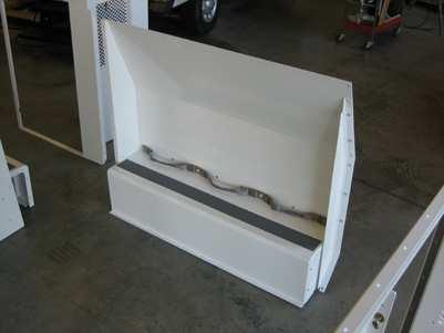Rear bulkhead/door assembly