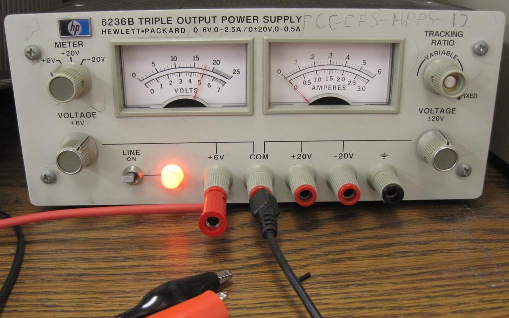 Figure 20: Power supply on with probes attached STOP: Have the lab instructor review your setup and circuit before you continue. Connect the Power Supply Switch off the power supply.