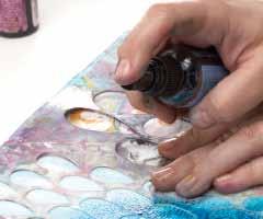 18 Use blue and plum inks to add stenciled texture to the