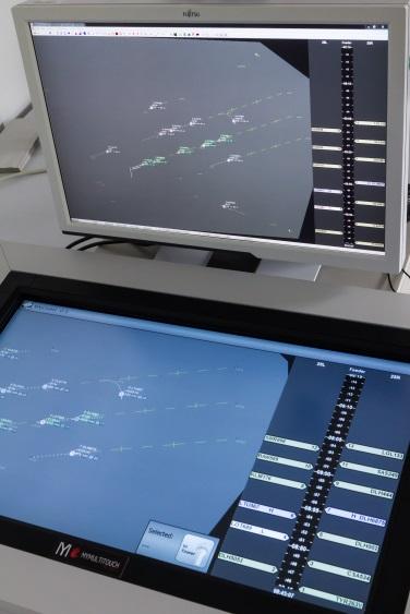 overview AMAN sequence/runway allocation advisory Multi-touch interaction device for section of traffic situation