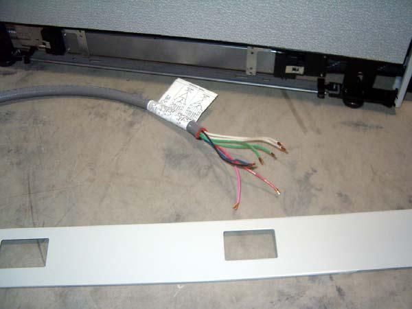Base in-feeds are installed at unused duplex outlet locations.