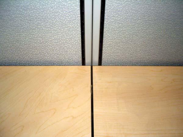 Worksurfaces should touch While holding worksurfaces in place and