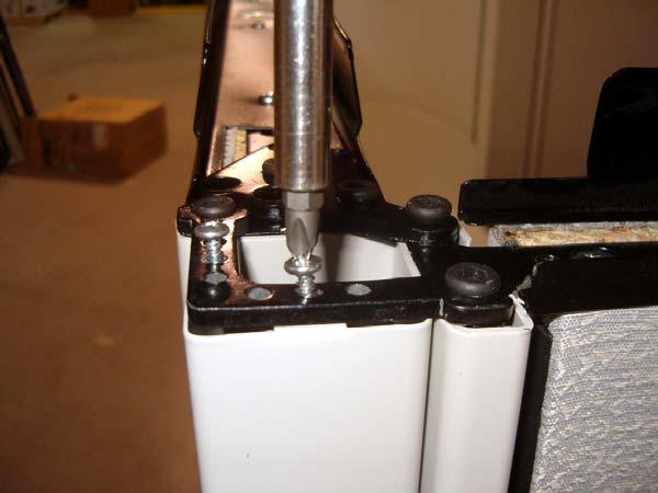 Using supplied #6 sheet metal screws, screw down through
