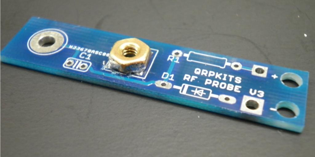 attach the 4-40 brass nut to the top of the circuit board Use the 7/16