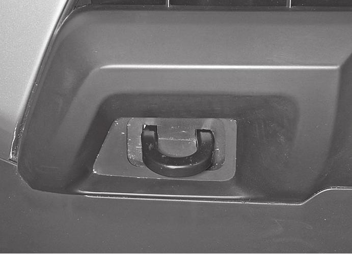 STEP 1 Start installation from under the front of the vehicle. Remove the plastic splash guard from below-behind bumper, (Fig 1).