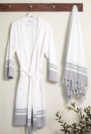 The lightweight yet absorbent towels feature a hand-knotted fringe.