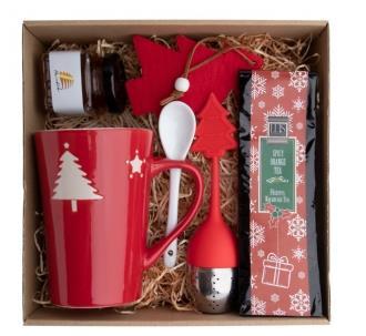 Tea gift set including of christmas mug, of tea infuser, of Christmas tree