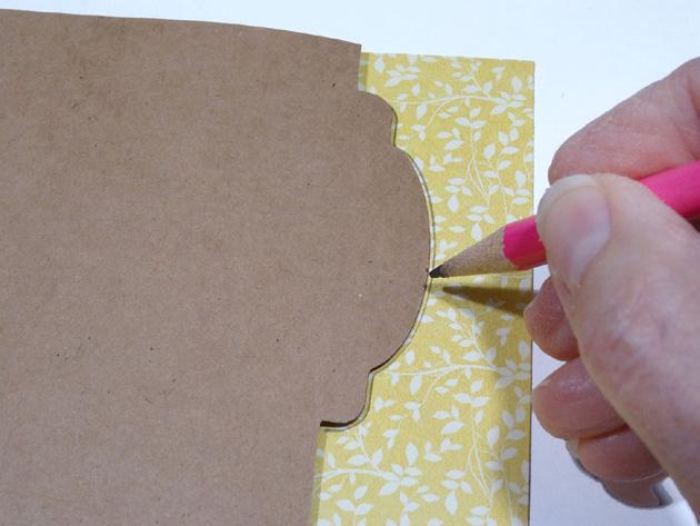 17. From a kraft tabbed page, trace the tab onto the B-side of Sunlit Petals and cut out.