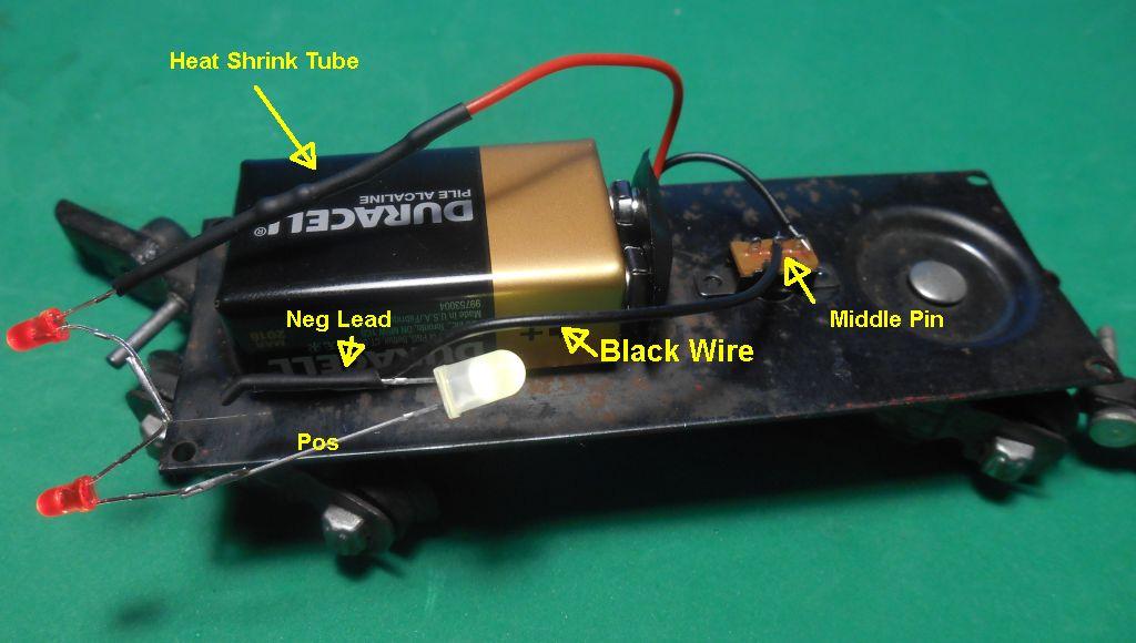 high heat. Strip, tin and solder the black wire to the Negative lead of white LED.