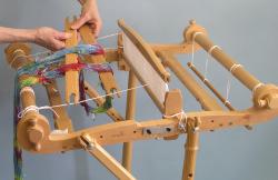 Make sure that they are not tied to the back beam or you won t be able to wind on the warp.