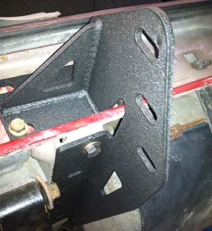 plates. Install the (4 per side) previously removed OE bolts in the rear facing holes.