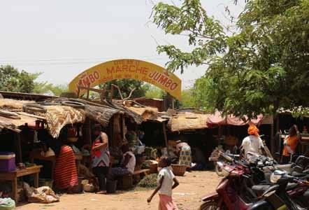 One of the formal neighborhood markets in Ouagadougou, Burkina Faso. Market in Kumbungu, a village close to Tamale, Ghana.