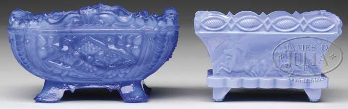Lot 2019 TWO LACY GLASS OPEN SALTS 1) Neal OP-17 in opalescent dark blue; rated as very rare. 2) Neal CT-1 in opaque blue; rated as very rare. SIZE: Ranges from 3" to 3-1/2" w.