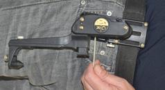 Adjust the position of holster on your belt for