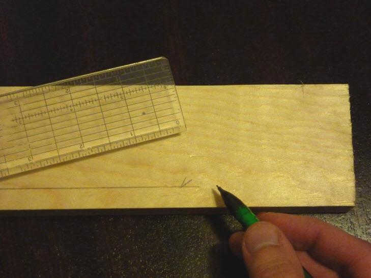 Repeat measuring & making marks a few times across the board all the way to the other side.